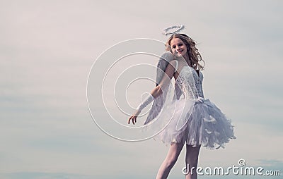 Cupid in valentine day. Love card. Charming curly little girl in white dress and wings - angel cupid girl. Angel Stock Photo