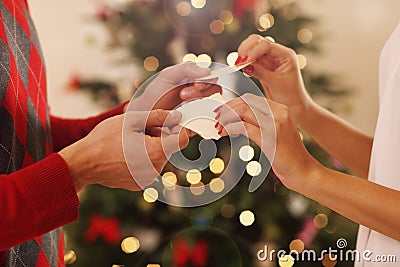 Cuple sharing Christmas wafer in Poland Stock Photo