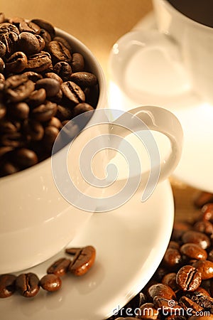 Cups of coffee, full of beans. Stock Photo