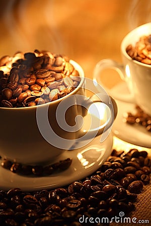 Cups of coffee, full of beans. Stock Photo