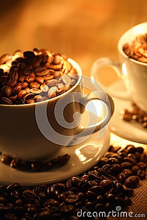 Cups of coffee, full of beans. Stock Photo