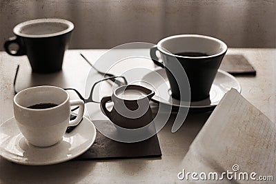 Cups of coffee, glasses, milk Stock Photo