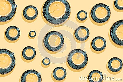 Cups of coffee pattern. Coffee in blue cup on yellow background. Top view Stock Photo