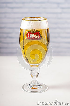 A cups of Stella Artois full of beer Editorial Stock Photo