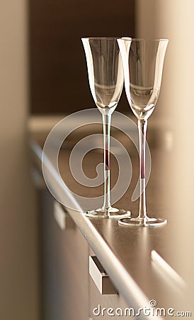 Cups on table in modern kitchen Stock Photo