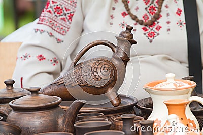 And cups, traditional style pottery, on shadowles summer day, sale Stock Photo