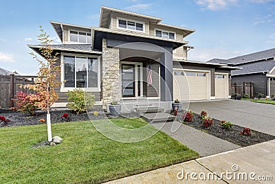 Curb appeal of brand-new home in brown and beige colors Stock Photo