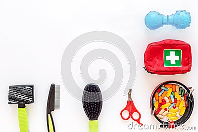 Cure tools for pet cat and dog with pills treatment in grooming set on white background top view mock-up Stock Photo