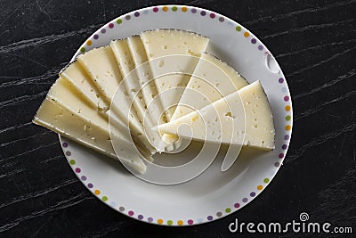 Cured cheese dish, Manchego type, Spain Stock Photo