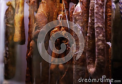 Cured sausage hung Stock Photo