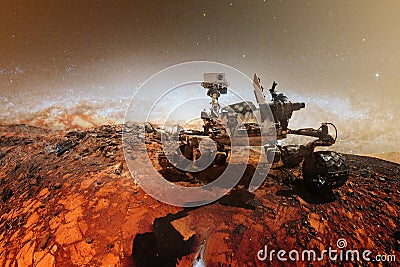 Curiosity Mars Rover exploring the surface of red planet Stock Photo