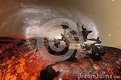 Curiosity Mars Rover exploring the surface of red planet Stock Photo