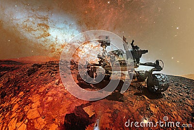 Curiosity Mars Rover exploring the surface of red planet. Elements of this image furnished by NASA Stock Photo