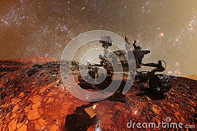 Curiosity Mars Rover exploring the surface of red planet. Elements of this image furnished by NASA Stock Photo