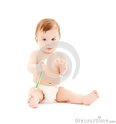Curious baby brushing teeth Stock Photo