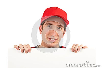 Curious teen behind white plac Stock Photo