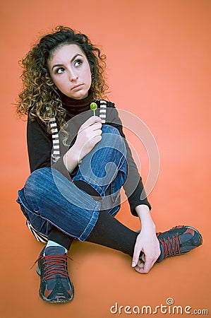 Curious Teen With A Lollipop Stock Photo