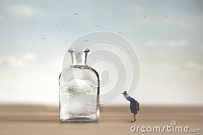 Curious woman observes with astonishment a cloud trapped in a vase Stock Photo