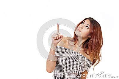 Curious woman pointing, choosing upward Stock Photo