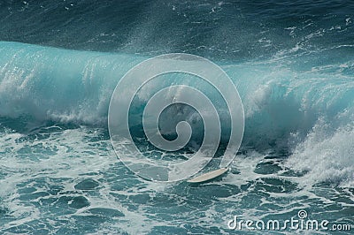 Curl Swallows Surfer During Competition Stock Photo