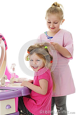 Curling Sissy`s Hair Stock Photo