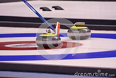 Curling Stones Stock Photo