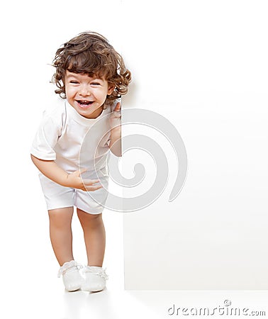 Curly funny girl holding blank advertising banner Stock Photo