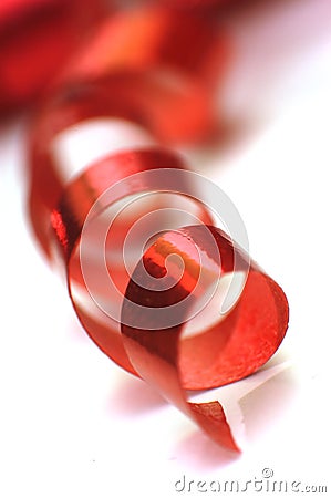 A curly red ribbon Stock Photo