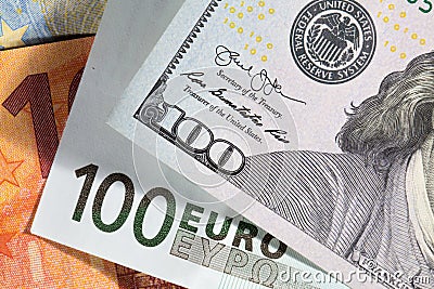 One hundred dollas and one hundred euro bills Stock Photo