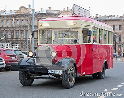 Retro bus carries tourists, conducts city tours. Travel around St. Petersburg. Editorial Stock Photo