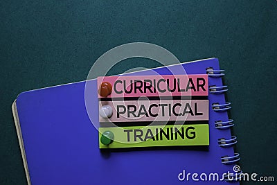 Curricular Practical Training text on sticky notes. Office desk background Stock Photo