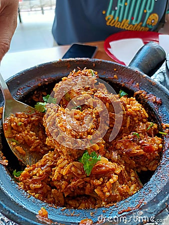 Curry chicken briyani rice claypot. Indian food Stock Photo