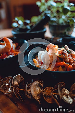Curry with prawns in bowls Stock Photo