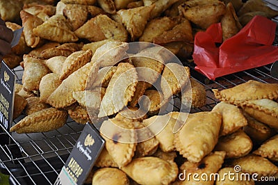 Curry puffs for sale. It is one of the traditional cakes in Malaysia. Editorial Stock Photo