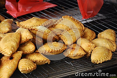 Curry puffs for sale. It is one of the traditional cakes in Malaysia. Stock Photo