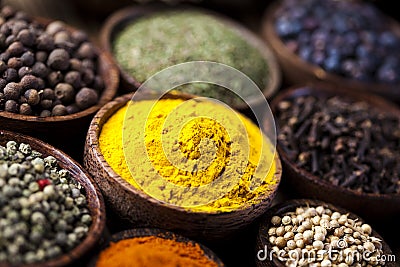 Curry, Wooden bowl spice Stock Photo