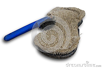 Currycomb and horseshoe scratcher Stock Photo