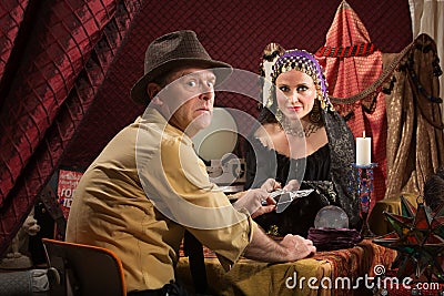 Cursed Man with Fortune Teller Stock Photo