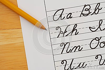 Cursive writing on vintage ruled line notebook paper Stock Photo