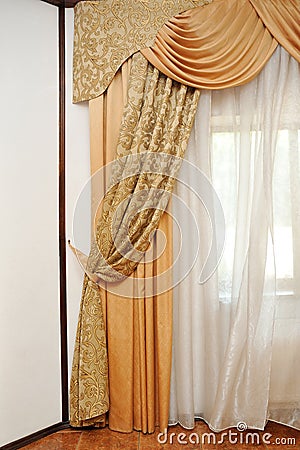 Curtain yellow gold on retro background Stock Photo