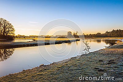 Curve in the Dutch river Mark on a windless day in winter Stock Photo