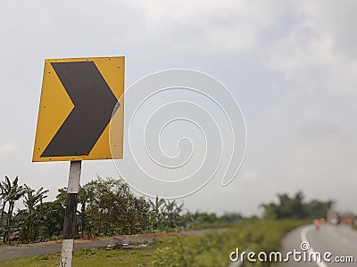 Curve right side traffic road sign on highway Stock Photo