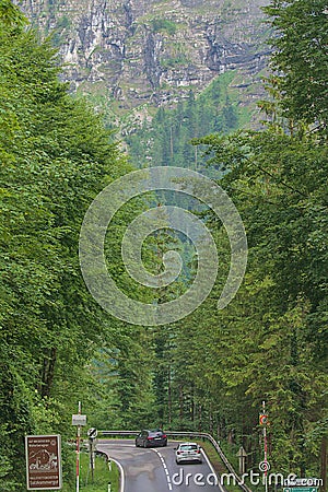 Curved mountain road in Obertraun in Salzkammergut region, Austrian Alps Editorial Stock Photo
