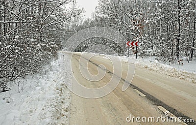 Curved muddy road Stock Photo