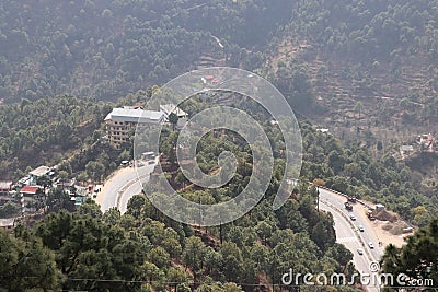 A curved road captured beautifully in the hills by a young photographer Stock Photo