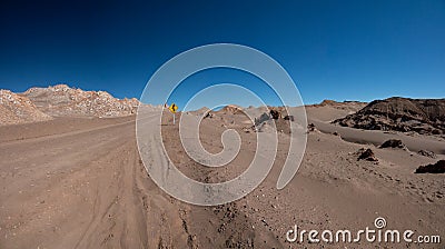 Curved road signal in the sand desert Stock Photo