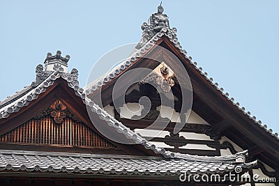 The curved roofs of Kuri topped with Morikuni. Kinkaku-ji temple. Kyoto. Japan Stock Photo