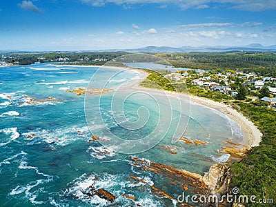 The curving sands of Tomakin beach and coast aerial views Australia Stock Photo