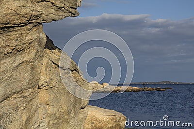 Curving shoreline with boulders and gravel along the Connecticut. Editorial Stock Photo