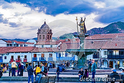 View of Plaza de Armas in Cusco in the evening with the statue of Pachacuti Editorial Stock Photo